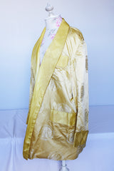 Women's vintage 1960's long sleeve gold yellow satin open front robe jacket with overall embroidered pattern