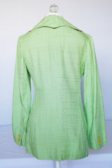 Women's vintage 1960's Saks Alley long sleeve two button closure double lapel blazer in light green and linen material.