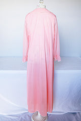 Women's vintage 1960's Saks Alley long sleeve two button closure double lapel blazer in light green and linen material.