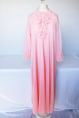 Women's vintage 1960's Saks Alley long sleeve two button closure double lapel blazer in light green and linen material.