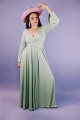 long sleeve ankle length teal colored vintage dress 1960's with deep v neck