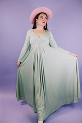 long sleeve ankle length teal colored vintage dress 1960's with deep v neck