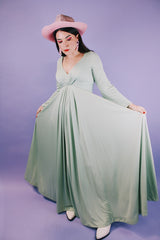 long sleeve ankle length teal colored vintage dress 1960's with deep v neck