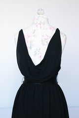 Women's vintage 1980's Morton Myles LTD., Union Made, Made in USA sleeveless rhinestone strap black midi length dress with V shaped neckline and ribbon tie belt.