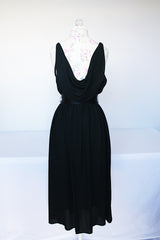 Women's vintage 1980's Morton Myles LTD., Union Made, Made in USA sleeveless rhinestone strap black midi length dress with V shaped neckline and ribbon tie belt.