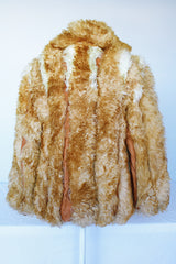 Women's vintage 1970's Designer Originals, Dino Ricco label long sleeve zip up tan brown faux fur jacket with rounded collar and side pockets.