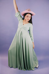 long sleeve ankle length teal colored vintage dress 1960's with deep v neck