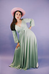 long sleeve ankle length teal colored vintage dress 1960's with deep v neck