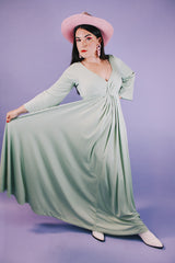 long sleeve ankle length teal colored vintage dress 1960's with deep v neck