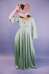 long sleeve ankle length teal colored vintage dress 1960's with deep v neck