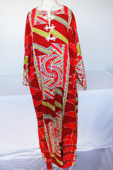 Women's vintage 1970's long sleeve printed cotton muu muu dress in red, green, grey, and white.