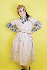 Women's vintage 1960's short sleeve midi length shift dress in oyster off white color