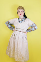 Women's vintage 1970's Golden Vee label long sleeve blue and brown plaid print button up shirt with dagger collar and brown buttons.