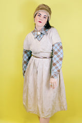 Women's vintage 1960's short sleeve midi length shift dress in oyster off white color