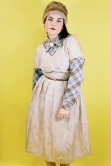 Women's vintage 1970's Golden Vee label long sleeve blue and brown plaid print button up shirt with dagger collar and brown buttons.