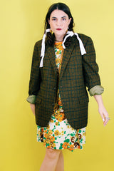 Women's or men's vintage 1970's The Men's Store, Carson Pirie Scotte Co. label long sleeve button up wool blazer in forest green plaid print.