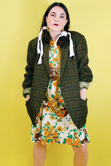 Women's or men's vintage 1970's The Men's Store, Carson Pirie Scotte Co. label long sleeve button up wool blazer in forest green plaid print.