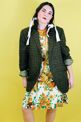 Women's or men's vintage 1970's The Men's Store, Carson Pirie Scotte Co. label long sleeve button up wool blazer in forest green plaid print.