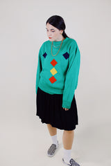 long sleeve kelly green pullover sweater with navy, yellow, and red diamond pattern vintage 1980's