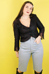 Women's vintage 1980's Rocking Brand label knee length light blue denim bermuda shorts with zipper and button closure in the front.