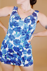 white and blue floral printed vintage 1950's swimsuit with skirt over bottoms one piece