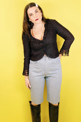 Women's vintage 1980's Rocking Brand label knee length light blue denim bermuda shorts with zipper and button closure in the front.