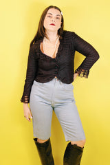 Women's vintage 1980's Rocking Brand label knee length light blue denim bermuda shorts with zipper and button closure in the front.