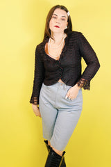 Women's vintage 1980's Rocking Brand label knee length light blue denim bermuda shorts with zipper and button closure in the front.