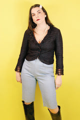 Women's vintage 1960's Charles F. Borg, Portland, Oregon label long sleeve black lace button up lace blouse with ruffle lace trim.