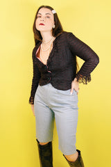 Women's vintage 1960's Charles F. Borg, Portland, Oregon label long sleeve black lace button up lace blouse with ruffle lace trim.