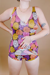 vintage 1970's floral printed one piece swimsuit with wrap bust and skirt front