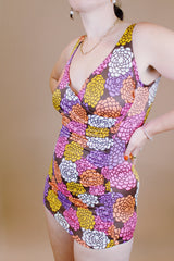 vintage 1970's floral printed one piece swimsuit with wrap bust and skirt front