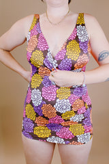 vintage 1970's floral printed one piece swimsuit with wrap bust and skirt front
