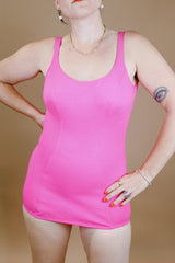 hot pink vintage 1960's one piece swimsuit with adjustable straps and skirt in front