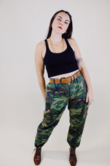 green camo print us military pants with pockets and adjustable waist and ankles vintage