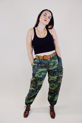 green camo print us military pants with pockets and adjustable waist and ankles vintage