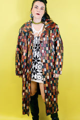Women's or men's vintage 1970's long sleeve long length leather patchwork jacket with multicolored patchwork squares.