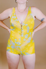 one piece vintage 1950's swimsuit in yellow with grey floral print