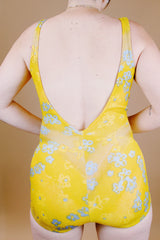 one piece vintage 1950's swimsuit in yellow with grey floral print