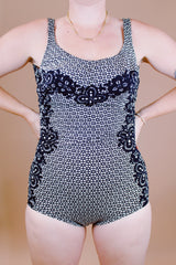black and white vintage 1960's one piece swimsuit in a lace looking print