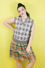 Women's vintage 1970's Pretty Plus label plaid print knee length pencil skirt with elastic waistband in a wool blend material.