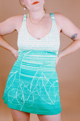 green and white printed one piece vintage 1960's swimsuit with full skirt