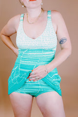 green and white printed one piece vintage 1960's swimsuit with full skirt