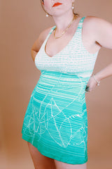 green and white printed one piece vintage 1960's swimsuit with full skirt