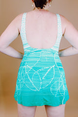 green and white printed one piece vintage 1960's swimsuit with full skirt