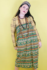 Women 's vintage 1970's cotton lightweight ankle length maxi skirt in all over green and brown abstract print.