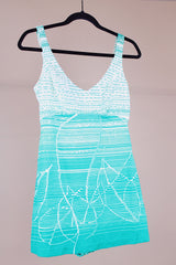 green and white printed one piece vintage 1960's swimsuit with full skirt