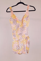 sleeveless one piece bathing suit in pink orange and yellow paisley print with skirt over bottom vintage 1970's