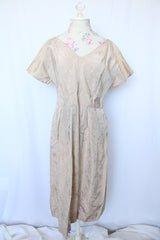 Women's vintage 1960's short sleeve midi length shift dress in oyster off white color