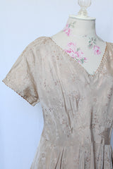 Women's vintage 1960's short sleeve midi length shift dress in oyster off white color